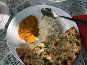Served with Rice. Roti w/ Garlic -   at Goa Restaurant in Weilheim