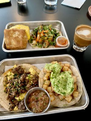 Vegan breakfast tacos and sandwich with JUST egg and Beyond sausage.  at Tellus Joe in Austin