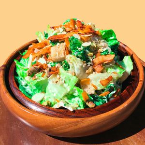 Green Caesar Salad with Crispy Coconut Bacon and Sourdough Croutons  at Golden State Vegan Sushi in Bangkok