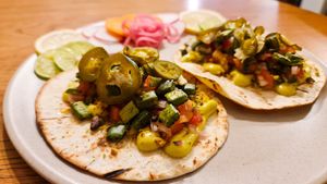 Cactus Tacos - Salt and Pepper fried cactus pads, avocado crema, tomato salsa, vegan cheese.  at Golden State Vegan Sushi in Bangkok