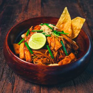 Pad Thai Spaghettini - Wok Fry Spaghettini, Tofu, Scallion, Carrot, Wonton Chips, Lime Wedge, Peanuts, Tamarind Sauce at Golden State Vegan Sushi in Bangkok
