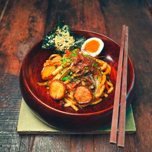Golden Yaki Udon -Wok Fry Japanese Udon with Mushroom ‘Scallops’, Crispy Seaweed, Yakisoba Sauce, Coconut Soft-Boil 'Egg' at Golden State Vegan Sushi in Bangkok