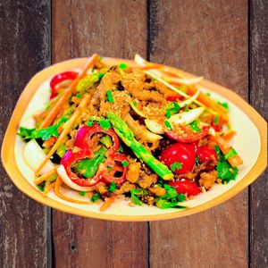 Satay Salad - Crispy Mushroom, Asparagus, Pepper, Sunflower Sprouts, Onion, Carrot, Tomato, Peanuts, Satay Peanut Dressing at Golden State Vegan Sushi in Bangkok