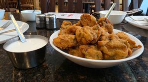 Mushroom fritters with vegan mayo dipping sauce. They may not look like much, but they were so great.  at Ashiana Vegetarian Restaurant in Nairobi