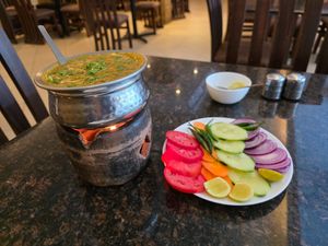 Palak Daal and raw veg. Delicious! at Ashiana Vegetarian Restaurant in Nairobi