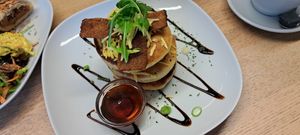 Pancake stack with cheeze, maple syrup, bakon at Vegan Earth in Ayr