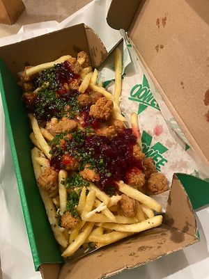 the christmas fries with chicken, gravy, cheese and cranberry sauce  #Veganuary at Oowee Vegan in South West London