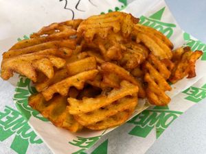 Garlic butter waffle fries  at Oowee Vegan in South West London