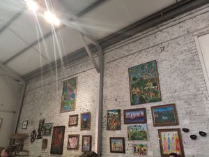 Love the artwork and high ceiling at Carmo in New Orleans