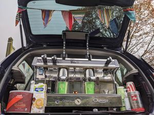 Gloria ready to make silky oat latte, creamy hot chocolate, and more. at New Dawn Vegan Coffee Shop in Borrowdale