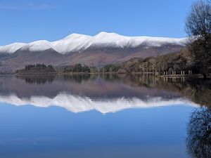 Skiddaw mountain range, January 2021 snow, viewed from our pitch in Borrowdale. at New Dawn Vegan Coffee Shop in Borrowdale