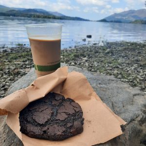 Ice oat latte and chocolate cookie at New Dawn Vegan Coffee Shop in Borrowdale