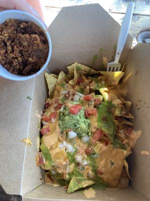 Full Nachos w walnut chorizo on side at Pomegranate Cafe in Phoenix