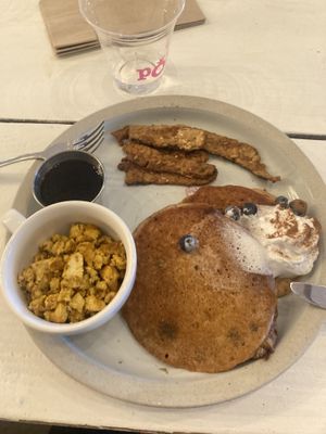 Tempeh bacon, tofu scramble, pancakes  at Pomegranate Cafe in Phoenix