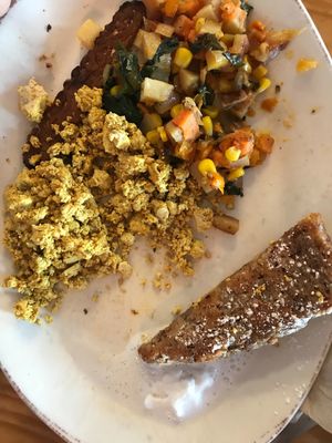 Pom platter-French toast w/ coconut cream, tofu scramble, potato hash, tempeh bacon at Pomegranate Cafe in Phoenix
