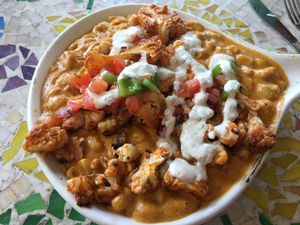 Vegan mac and cheese with buffalo cauliflower - yum! at Pomegranate Cafe in Phoenix