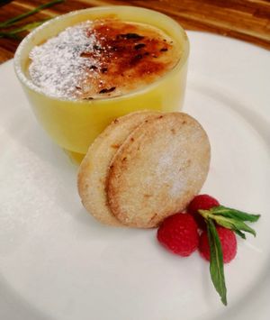 White pepper Creme Brûlée, Fig & Prune compote, served with an orange shortbread biscuits at Nelsons Wine Bar in Hebden Bridge