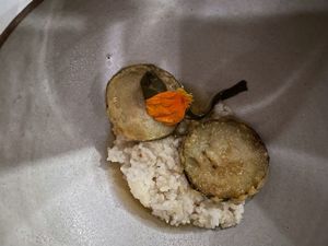 Zucchini tempura, Carolina rice, shio koji, mushroom dashi, pickled kombu at Roselily in South Bend