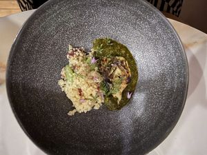 Artichoke, Morrocan couscous, fava, ramps, nasturtium, chermoula at Roselily in South Bend