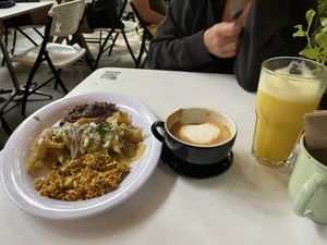 Scrambel tofu Mexi style, mango orange jucie and the best coffe in play the carmen   at Corazon Contento PDC in Playa Del Carmen