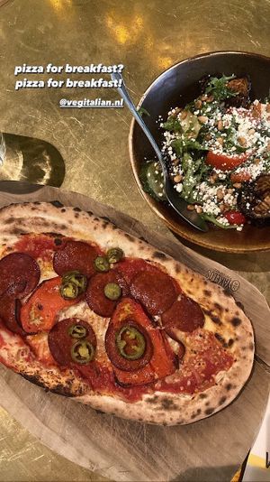 Peperoni Pizza and side salad  at Vegitalian - Schoutenstraat in Utrecht