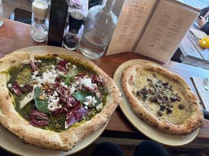 Vegan Feta and cavolo Nero pizza and truffled mushroom pizza  at Vegitalian - Schoutenstraat in Utrecht