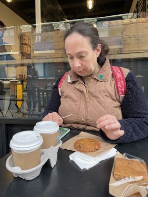 We’ll be glad when the takeaway cups are no more. Have invested in reusable ones now. Legendary blondie is on the right. The cookie is also vegan   at Wired Co in North West London