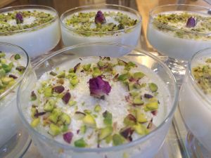 Mouhalabe: milk pudding with coconut, Aegina pistachios, orange blossom water and rose at Tastes of Damascus in Athens