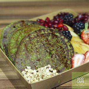 Spinach pancakes with fruit and berries at Eco Cafe in Tashkent