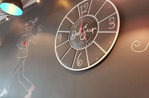 Clock inside DelSur at DelSur Empanadas in Minnetonka