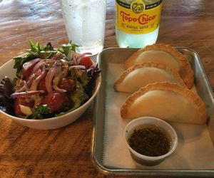 "Vegan Beef" empanadas & vegan dipping sauce with a side salad. at DelSur Empanadas in Minnetonka