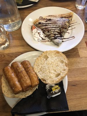 Vegan sausage roll and strawberry chocolate crepe  at Wanderlust Cafe & Bistro in Edinburgh