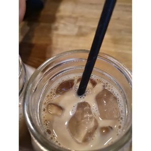 Iced Caramel Coffee made with Oat Milk. at Wanderlust Cafe & Bistro in Edinburgh