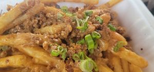 Good portion of tasty loaded fries. at Winter Park Biscuit Company in Orlando