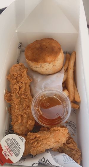 box w tenders, biscuit, fries and vegan honey!  at Winter Park Biscuit Company in Orlando
