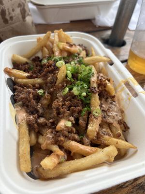 Loaded fries! Delicious 🤤   at Winter Park Biscuit Company in Orlando