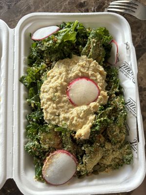 kale salad with chickpea salad on top   at Winter Park Biscuit Company in Orlando