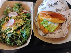 Kale side salad and chick'n sandwich with cheese at Winter Park Biscuit Company in Orlando