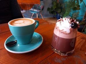 Oat milk latte & oat milk blackforest hot choc at Koda Coffee in Scarborough