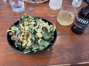 Tempeh caesar salad & lemon and ginger kombucha  at Koda Coffee in Scarborough
