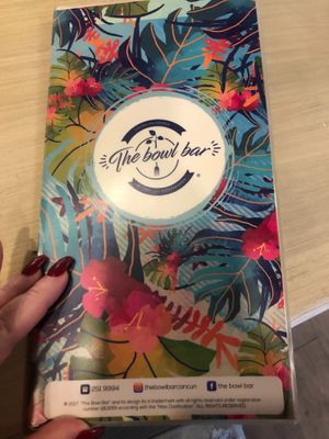 Name and social at The Bowl Bar in Cancun