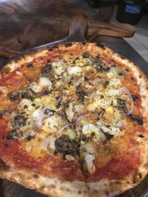 Potato, onion, mushroom, shallots pizza with vegan cheese  at The Master & Margherita in Grey Lynn