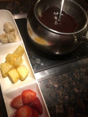 Chocolate fondue with some of the accompanying fruit at The Melting Pot in Oklahoma City