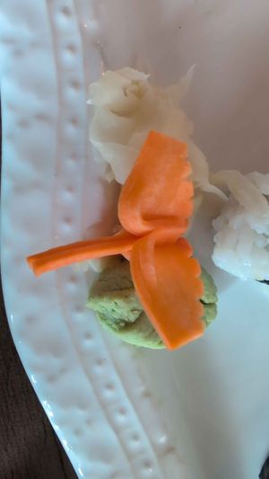 Carrot shaped like a bird and wasabi shaped life a leaf at 168 Thai & Sushi in Middleburg
