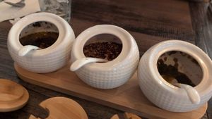 I asked for my curry to be extra, extra spicy (it was not spicy last time) so they brought out the spices: oil, red pepper flakes, and chili paste at 168 Thai & Sushi in Middleburg