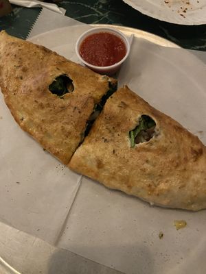 Spinach mushroom calzone  at Daytona Pizza & Wing Co in Daytona Beach