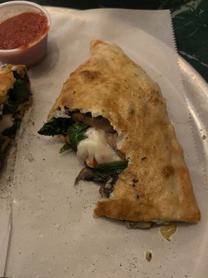 Spinach mushroom calzone  at Daytona Pizza & Wing Co in Daytona Beach