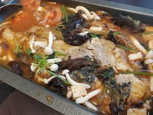 Grilled "fish" in tomato broth.  at Lotus Vegetarian 莲心 - Novena in Central Singapore