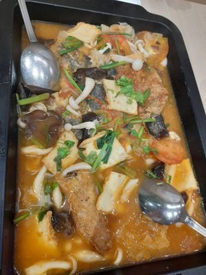 Grilled housemade mock fish in tomato broth at Lotus Vegetarian 莲心 - Novena in Central Singapore