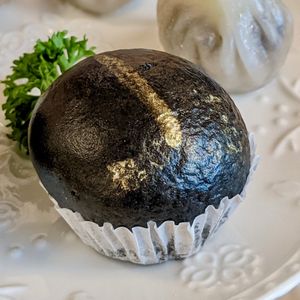 Charcoal Black Sesame Bun at Lotus Vegetarian 莲心 - Novena in Central Singapore